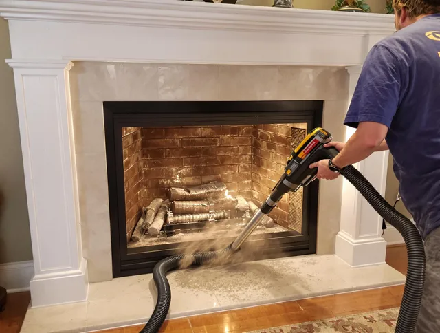 Fireplace cleaning performed by Norton Chimney Sweep in Norton, MA